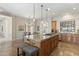 Stylish kitchen features a center island, breakfast bar, and open layout to the dining area at 6340 E Marioca Cir, Scottsdale, AZ 85266