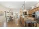 Well-appointed kitchen with views into breakfast nook, stainless steel appliances, and tile floors at 6340 E Marioca Cir, Scottsdale, AZ 85266