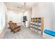 Versatile bonus room with carpet, ceiling fan, storage, and natural light, perfect for recreation or hobbies at 6920 W Tether Trl, Peoria, AZ 85383