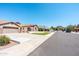 Charming home situated on a well-maintained street with mature landscaping and mountain views at 6920 W Tether Trl, Peoria, AZ 85383