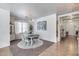 Elegant dining room with a decorative chandelier, and stylish furniture for entertaining at 7015 S Stadium Ct, Gilbert, AZ 85298