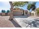 Attractive single-story home with a two-car garage and desert landscaping at 7015 S Stadium Ct, Gilbert, AZ 85298