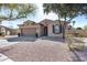 Attractive single-story home featuring desert landscaping at 7015 S Stadium Ct, Gilbert, AZ 85298