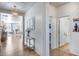 Bright, open hallway featuring tile flooring and views into the living spaces at 7015 S Stadium Ct, Gilbert, AZ 85298