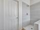 Modern walk-in shower with tiled walls and a rainfall shower head, offering a spa-like experience at 7015 S Stadium Ct, Gilbert, AZ 85298
