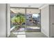 Bright bedroom view featuring large windows with views of the surrounding patios and landscape at 7137 E Rancho Vista Dr # 6009, Scottsdale, AZ 85251