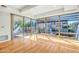 Bright living room featuring floor-to-ceiling windows and hardwood flooring at 7137 E Rancho Vista Dr # 6009, Scottsdale, AZ 85251