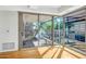 Sunlit living area featuring floor to ceiling windows with a sliding glass door to the patio at 7137 E Rancho Vista Dr # 6009, Scottsdale, AZ 85251