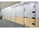 Modern racquetball court with glass doors and wood floors, perfect for sports enthusiasts at 7137 E Rancho Vista Dr # 6009, Scottsdale, AZ 85251