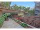 Picturesque courtyard view with a large, comfortable sofa visible on the covered patio at 7151 E Rancho Vista Dr # 2006, Scottsdale, AZ 85251