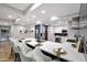 Open concept kitchen features a large island with barstool seating, stainless appliances, and ample natural light at 7151 E Rancho Vista Dr # 2006, Scottsdale, AZ 85251