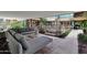 Comfortable outdoor seating with plush sectional sofa and stylish accent tables at 7151 E Rancho Vista Dr # 2006, Scottsdale, AZ 85251