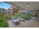 Relaxing patio with lounge chairs and lush greenery, perfect for enjoying the outdoors at 7151 E Rancho Vista Dr # 2006, Scottsdale, AZ 85251