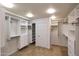 Spacious walk-in closet with custom shelving and ample storage options at 7151 E Rancho Vista Dr # 2006, Scottsdale, AZ 85251