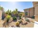 Backyard with desert landscaping, cacti, gravel, and arid plants at 7739 E Evening Glow Dr, Scottsdale, AZ 85266