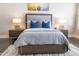Inviting bedroom with a cozy bed, decorative pillows, matching nightstands and soft lighting at 7739 E Evening Glow Dr, Scottsdale, AZ 85266