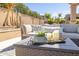 Inviting outdoor patio with comfortable seating and desert landscaping at 7739 E Evening Glow Dr, Scottsdale, AZ 85266