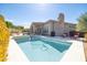 An inviting pool is bordered by lounge chairs and landscaped with trees, creating a private backyard oasis at 7739 E Evening Glow Dr, Scottsdale, AZ 85266