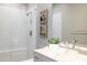 Bright shower featuring a sleek design, light tile, and modern fixtures for a refreshing experience at 7739 E Evening Glow Dr, Scottsdale, AZ 85266
