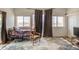 Bright bedroom with a comfortable bed, area rug, and lots of natural light at 8210 S 132Nd Ave, Goodyear, AZ 85338