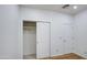 Bedroom closet featuring built-in storage and clean, modern design at 8210 S 132Nd Ave, Goodyear, AZ 85338