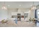 Beautiful kitchen with granite countertops, modern appliances, and stylish pendant lighting at 8210 S 132Nd Ave, Goodyear, AZ 85338