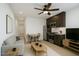 Inviting living room and kitchen with modern appliances and stylish furniture at 8210 S 132Nd Ave, Goodyear, AZ 85338