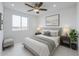 Comfortable main bedroom featuring a plush bed, soft lighting, and tasteful decor at 8210 S 132Nd Ave, Goodyear, AZ 85338