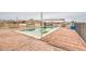 Enjoy a backyard pool, hot tub, covered patio, and relaxing lounge area perfect for hot summer days at 8210 S 132Nd Ave, Goodyear, AZ 85338