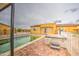 Swimming pool and hot tub area with views of the backyard and the house at 8210 S 132Nd Ave, Goodyear, AZ 85338