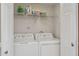 Bright laundry room with modern, matching washer and dryer units at 10 W Georgia Ave # 8, Phoenix, AZ 85013