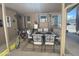 Relaxing covered patio with a dining table and comfortable seating at 1118 S Shawnee Dr, Apache Junction, AZ 85119