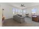 Spacious bonus room filled with natural light, perfect for a playroom or lounge area at 11607 W Marguerite Ave, Avondale, AZ 85323
