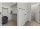 Spacious closet with ample storage and a pet litter box at 11607 W Marguerite Ave, Avondale, AZ 85323