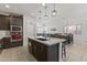 A modern kitchen featuring stainless steel appliances, sleek countertops, and ample cabinet space at 11607 W Marguerite Ave, Avondale, AZ 85323