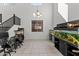 Office space with desk, stairs, and a fish tank at 11607 W Marguerite Ave, Avondale, AZ 85323