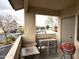 Enclosed balcony with a grill and tables to enjoy outdoor living and entertaining at 145 N 74Th St # 236, Mesa, AZ 85207