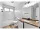 Bathroom with granite vanity and shower/tub combo at 1518 E Mineral Rd, Gilbert, AZ 85234