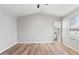 Bedroom featuring wood-look floors and en suite at 1518 E Mineral Rd, Gilbert, AZ 85234