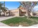 Charming single-Gathering home with well-manicured lawn, complemented by desert landscaping and neutral color palette at 1518 E Mineral Rd, Gilbert, AZ 85234