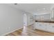 Bright eat-in kitchen with granite countertops and white cabinets at 1518 E Mineral Rd, Gilbert, AZ 85234