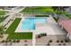 Community pool with surrounding green space and ample seating at 1518 E Mineral Rd, Gilbert, AZ 85234