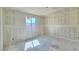 Unfinished bedroom with natural light, awaiting personalization and creative design at 15709 W Beryl Ave, Waddell, AZ 85355