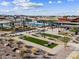 Community park features playground, pool, covered seating areas, and landscaping at 162 S 177Th Ln, Goodyear, AZ 85338