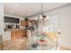 Bright kitchen with updated appliances, tiled floor, and ample counter space at 19975 N Crescent Way, Surprise, AZ 85374