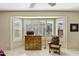 Bedroom featuring a large bay window, shutters, and neutral carpeting at 20139 N Rawhide Way, Surprise, AZ 85387