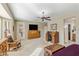 Large bedroom with decorative chest, rocking chair and access to the outdoor space at 20139 N Rawhide Way, Surprise, AZ 85387