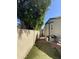 Spacious backyard with a well-maintained fence, grill, and tidy landscaping, offering a private outdoor retreat at 2070 W Klamath Ave, Apache Junction, AZ 85119