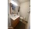 Bathroom featuring sink, vanity cabinet, toilet, and fixtures at 2070 W Klamath Ave, Apache Junction, AZ 85119