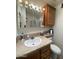 Bathroom sink and vanity cabinet with fixtures at 2070 W Klamath Ave, Apache Junction, AZ 85119